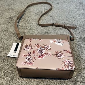 NineWest purse never used! Very pretty flowers designed.
